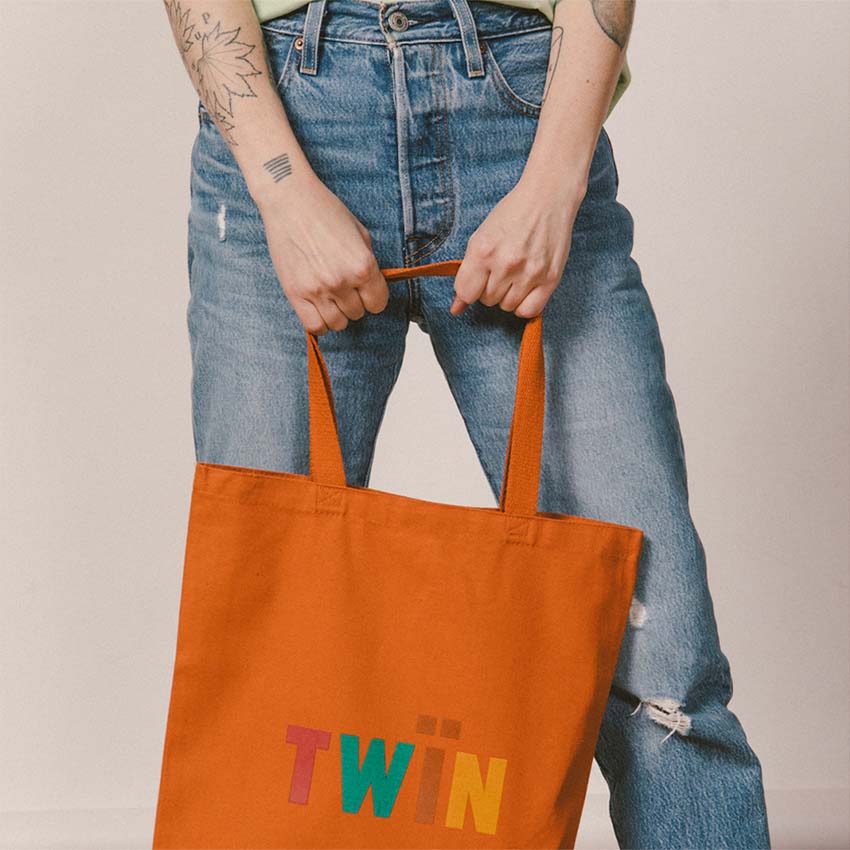 Tegan and Sara Twïn Texas Orange Tote Bag - Tegan and Sara Store Tegan and Sara Twïn Texas Orange Tote Bag - Tegan and Sara Store